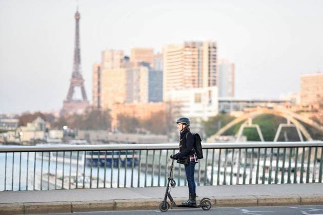 Paris introduces compulsory helmet use for e-scooter riders, archive footage