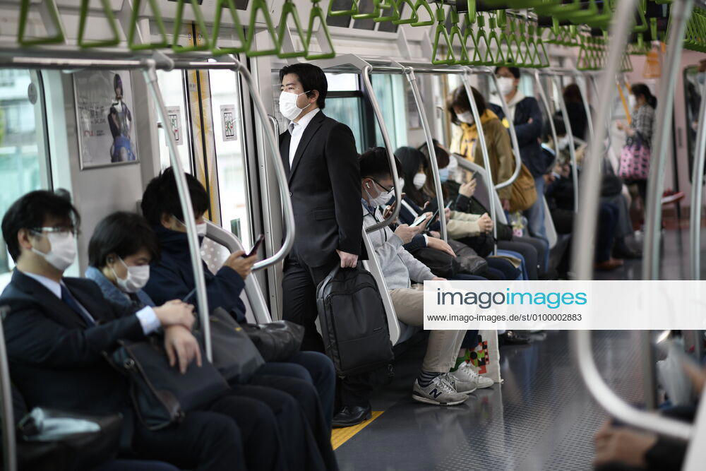 Commuters wearing face mask head to work early morning during a rush hour in Tokyo amid concerns of the COVID-19 coronavirus on Monday, April 27, 2020. Japanese Prime Minister Shinzo Abe declared a nationwide State of Emergency last week urging people to stay home to prevent the spreading of the coronavirus throughout the country. (Photo: Richard Atrero de Guzman AFLO) (125743268)