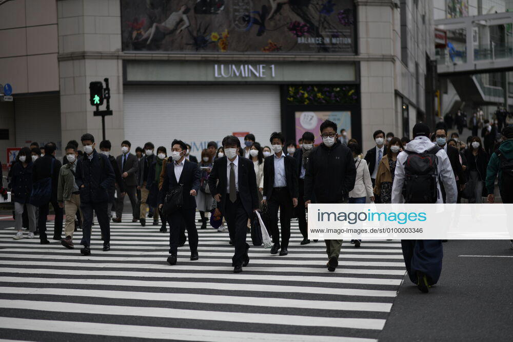 Commuters wearing face mask head to work early morning during a rush hour in Tokyo amid concerns of the COVID-19 coronavirus on Monday, April 27, 2020. Japanese Prime Minister Shinzo Abe declared a nationwide State of Emergency last week urging people to stay home to prevent the spreading of the coronavirus throughout the country. (Photo: Richard Atrero de Guzman AFLO) (125743379)