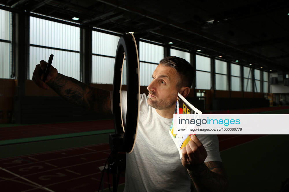 Potsdam Luftschiffhafen Kevin Kuske coach SC Potsdam with photo of his former bob pilot Andre Lange
