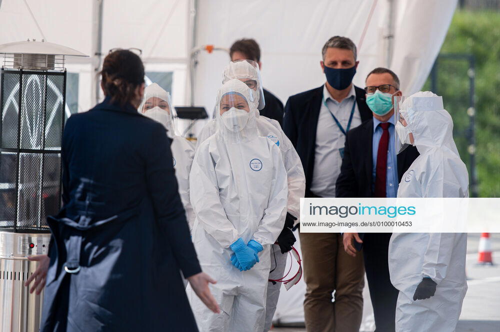 Medics are seen at the drive thru tent during their work. .The covid-19 drive thru testing center was opened in Gdansk on April 27. Tests are taken after prior registration. Patients without getting out of the car may be tested for coronavirus. Gdansk Poland - ZUMAs227 20200427_zip_s227_001