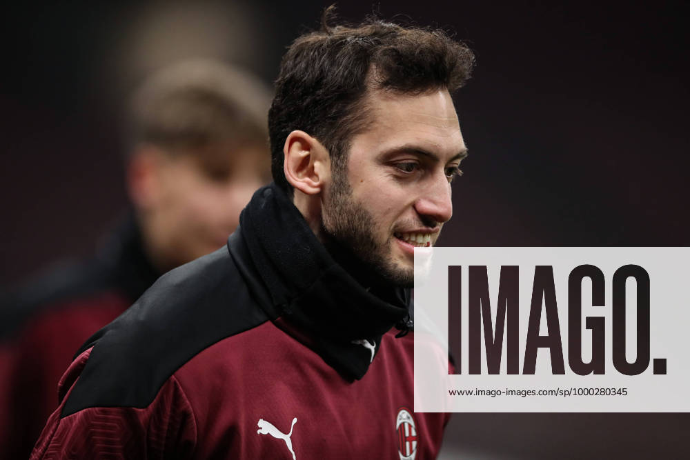 Hakan Calhanoglu of AC Milan during the warm up prior to the Coppa Italia match at Giuseppe Meazza, Milan. Picture date: 12th January 2021. Picture credit should read: Jonathan Moscrop Sportimage . SPI-0842-0067