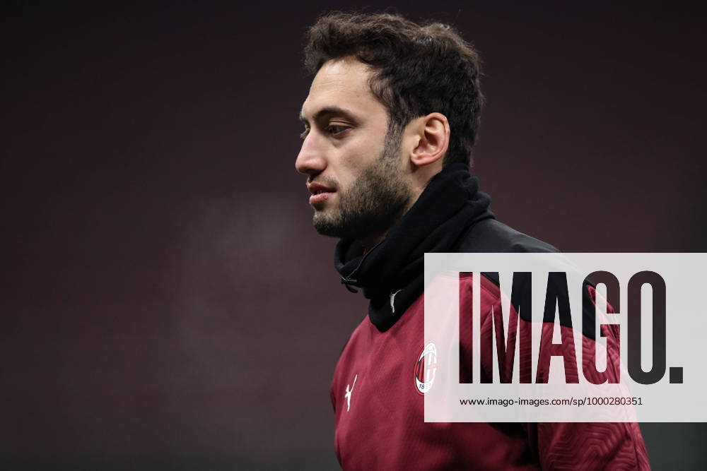 Hakan Calhanoglu of AC Milan during the warm up prior to the Coppa Italia match at Giuseppe Meazza, Milan. Picture date: 12th January 2021. Picture credit should read: Jonathan Moscrop Sportimage . SPI-0842-0071