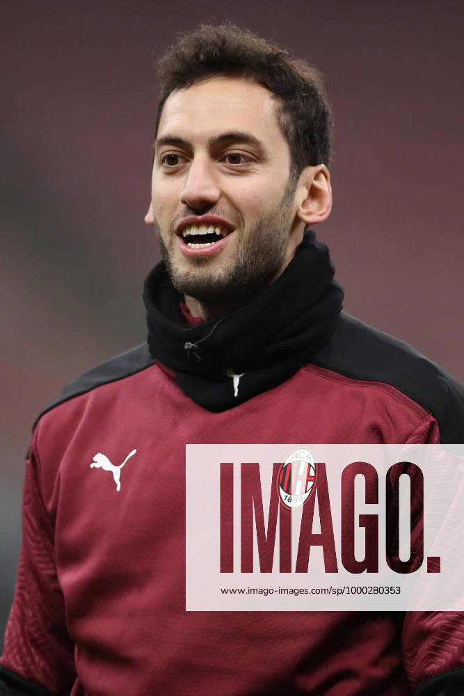 Hakan Calhanoglu of AC Milan during the warm up prior to the Coppa Italia match at Giuseppe Meazza, Milan. Picture date: 12th January 2021. Picture credit should read: Jonathan Moscrop Sportimage . SPI-0842-0073