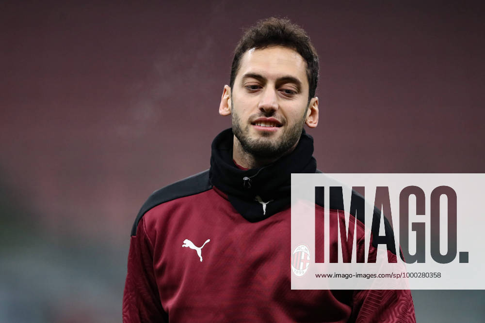 Hakan Calhanoglu of AC Milan during the warm up prior to the Coppa Italia match at Giuseppe Meazza, Milan. Picture date: 12th January 2021. Picture credit should read: Jonathan Moscrop Sportimage . SPI-0842-0078