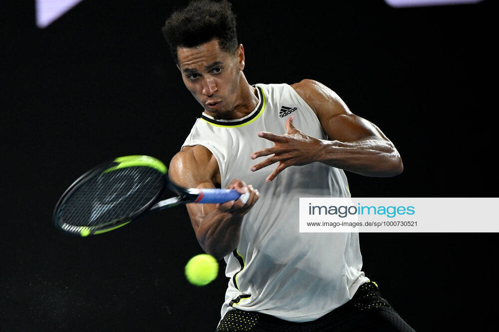 TENNIS AUSTRALIAN OPEN, Michael Mmoh of the USA in action during his second Round Men s singles match against Rafael Nadal of Spain on Day 4 of the Australian Open at Melbourne Park in Melbourne, Thursday, February 11, 2021. ( NO ARCHIVING, , NO USE IN BOOKS WITHOUT CONSENT MELBOURNE VIC AUSTRALIA