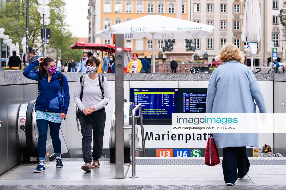 (200428) -- MUNICH, April 28, 2020 (Xinhua) -- Pedestrians wearing face masks are seen in Munich, Germany, April 27, 2020. In most German states, face masks or an equivalent mouth-and-nose cover have become mandatory on Monday when people travel by bus or train or go shopping. (Photo by Kevin Voigt Xinhua) GERMANY-MUNICH-COVID-19-FACE MASK