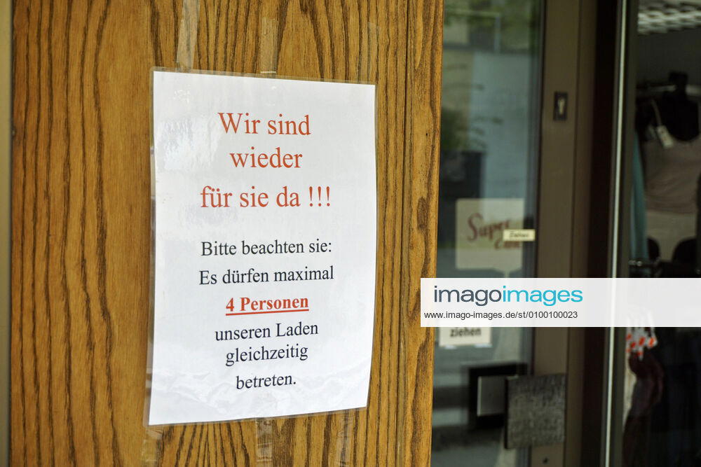 Relaxed exit restrictions due to corona virus pandemic in Bad Wörishofen, sign at a shop We are there for you again Please only 4 people in the shop at the same time 28 04 2020, Retail restricted due to corona virus 28 04 2020, Retail restricted due to corona virus
