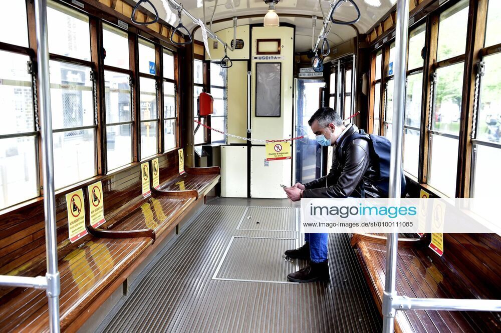 Milan, Coronavirus new signage for phase 2, respecting the sea distances inside the trams that in the stops, Advertising on Trams, public transport Atm (Duilio Piaggesi Fotogramma, Milan - 2020-04-28) p.s. la foto e utilizzabile nel rispetto del contesto in cui e stata scattata, e senza intento diffamatorio del decoro delle persone rappresentate