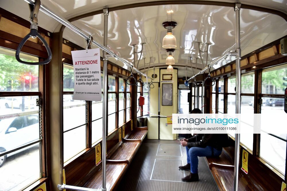 Milan, Coronavirus new signage for phase 2, respecting the sea distances inside the trams that in the stops, Advertising on Trams, public transport Atm (Duilio Piaggesi Fotogramma, Milan - 2020-04-28) p.s. la foto e utilizzabile nel rispetto del contesto in cui e stata scattata, e senza intento diffamatorio del decoro delle persone rappresentate