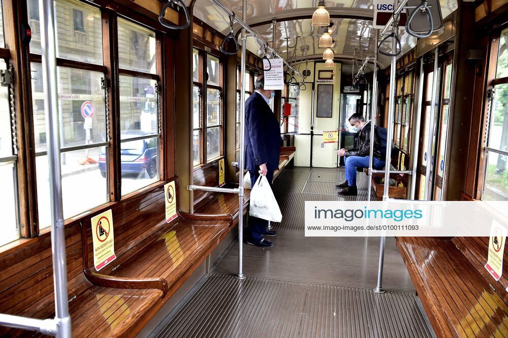 Milan, Coronavirus new signage for phase 2, respecting the sea distances inside the trams that in the stops, Advertising on Trams, public transport Atm (Duilio Piaggesi Fotogramma, Milan - 2020-04-28) p.s. la foto e utilizzabile nel rispetto del contesto in cui e stata scattata, e senza intento diffamatorio del decoro delle persone rappresentate