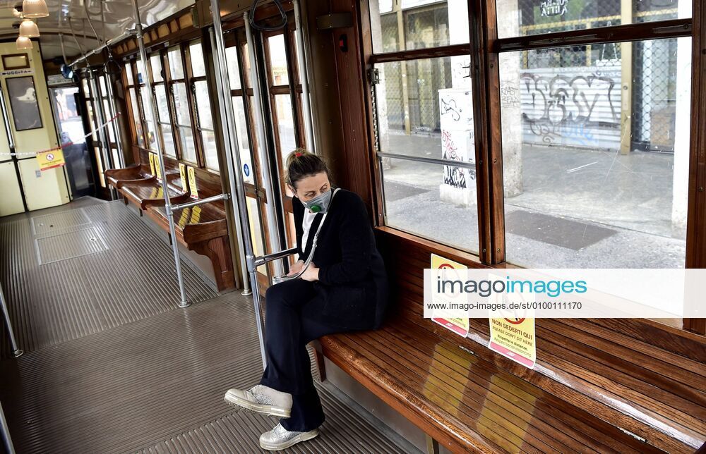 Milan, Coronavirus new signage for phase 2, respecting the sea distances inside the trams that in the stops, Advertising on Trams, public transport Atm (Duilio Piaggesi Fotogramma, Milan - 2020-04-28) p.s. la foto e utilizzabile nel rispetto del contesto in cui e stata scattata, e senza intento diffamatorio del decoro delle persone rappresentate