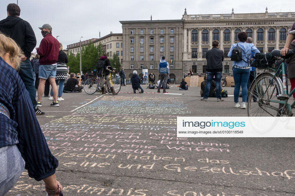 In Leipzig the constitution was painted with chalk on the floor in front of the Leipzig City Library while at a demonstration an open microphone was used for a corona debate for all there was Wilhelm Leuschner Platz Centre Saxony Germany