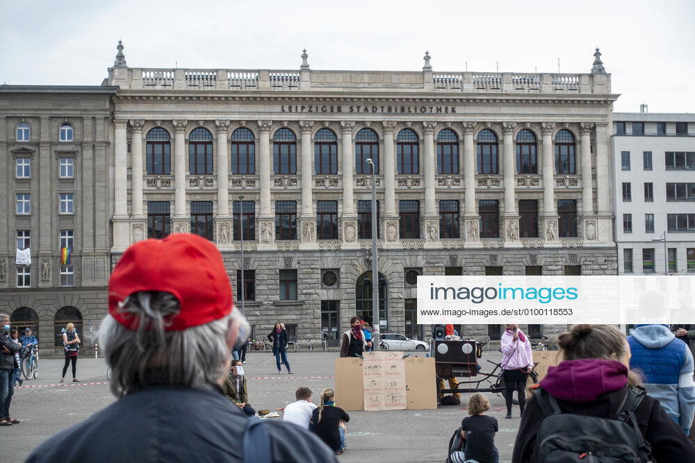 In Leipzig the constitution was painted with chalk on the floor in front of the Leipzig City Library while at a demonstration an open microphone was used for a corona debate for all there was Wilhelm Leuschner Platz Centre Saxony Germany