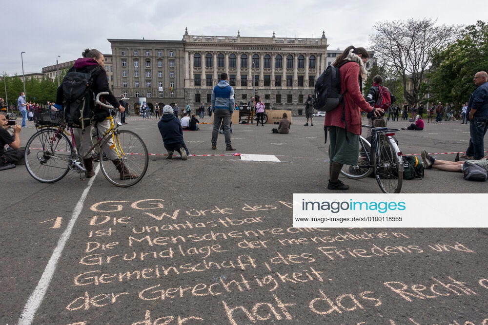 In Leipzig the constitution was painted with chalk on the floor in front of the Leipzig City Library while at a demonstration an open microphone was used for a corona debate for all there was Wilhelm Leuschner Platz Centre Saxony Germany
