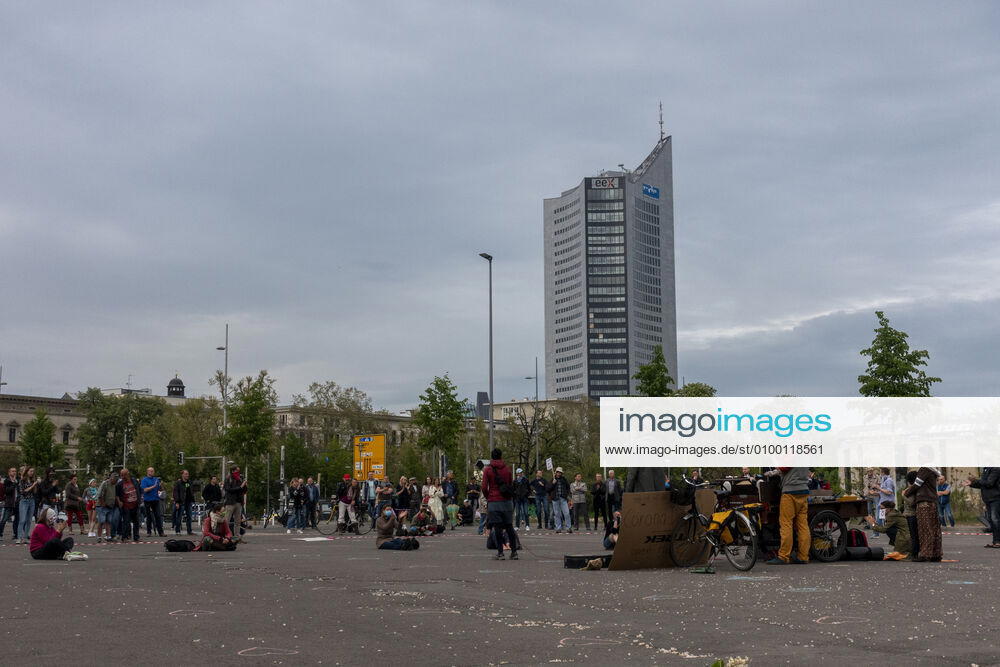 In Leipzig the constitution was painted with chalk on the floor in front of the Leipzig City Library while at a demonstration an open microphone was used for a corona debate for all there was Wilhelm Leuschner Platz Centre Saxony Germany