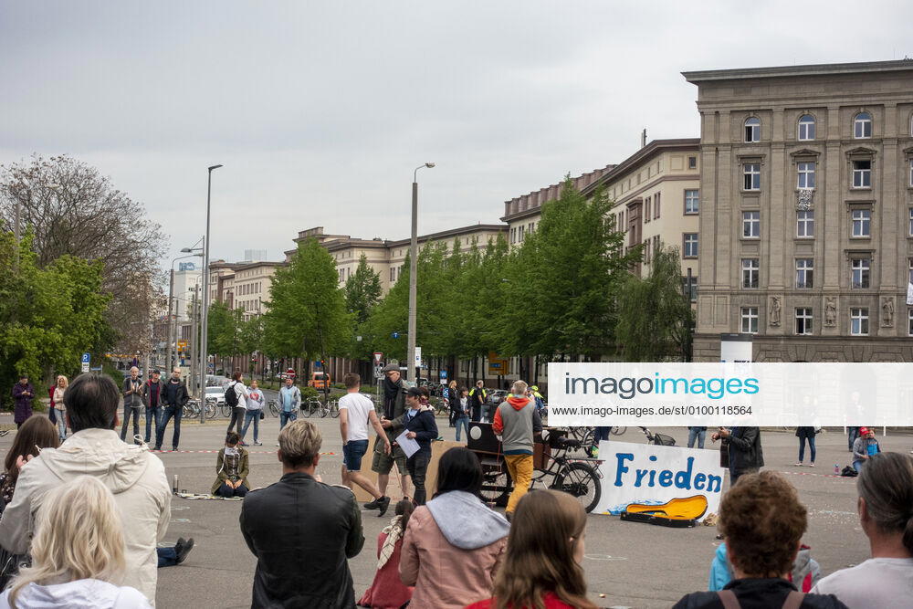 In Leipzig the constitution was painted with chalk on the floor in front of the Leipzig City Library while at a demonstration an open microphone was used for a corona debate for all there was Wilhelm Leuschner Platz Centre Saxony Germany