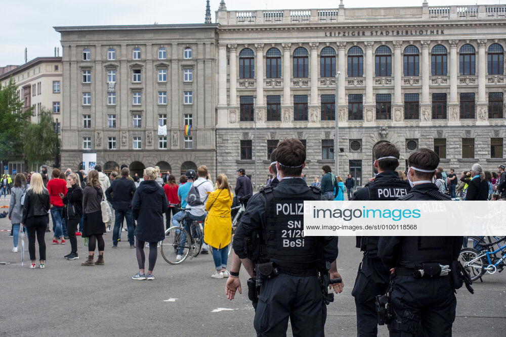 In Leipzig the constitution was painted with chalk on the floor in front of the Leipzig City Library while at a demonstration an open microphone was used for a corona debate for all there was Wilhelm Leuschner Platz Centre Saxony Germany