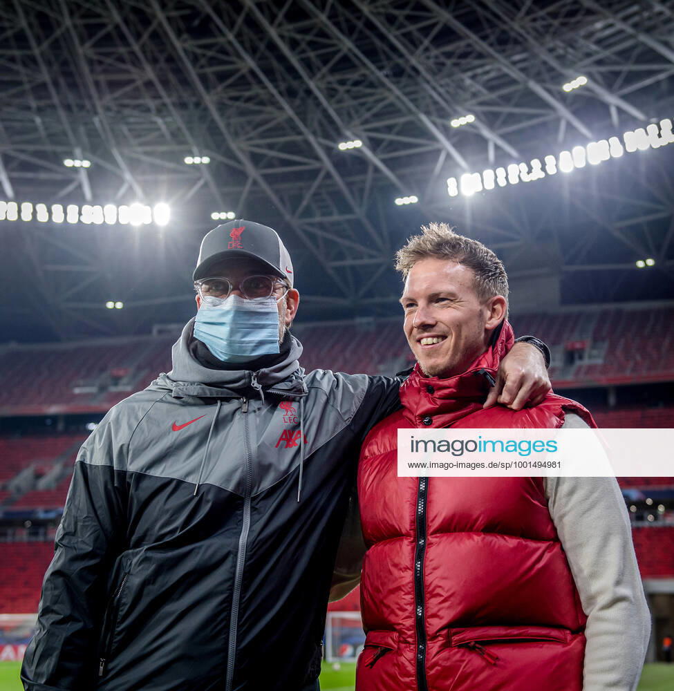 Liverpool coach Juergen Klopp and Leipzig coach Julian Nagelsmann stand together and talk UEFA Champions League Round of 16, second leg FC Liverpool RB Leipzig 2 0 10 03 2021, Puskas Arena in Budapest Hungary FC Liverpool RB Leipzig