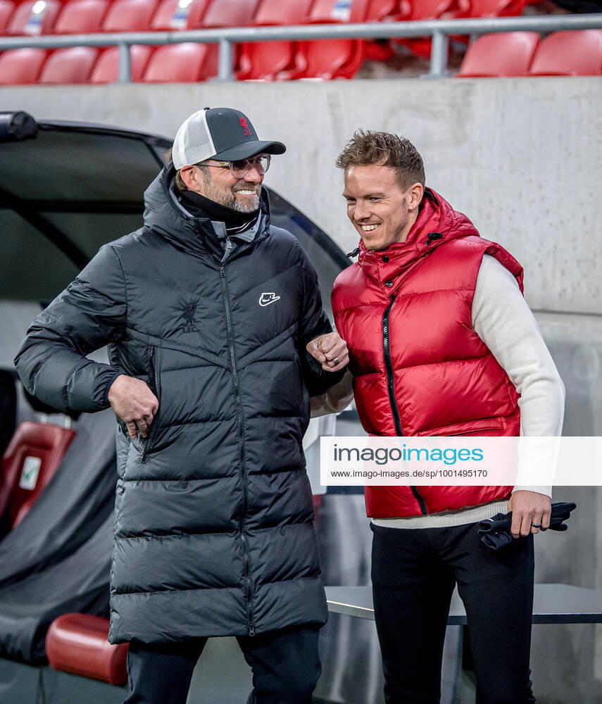 Liverpool coach Juergen Klopp and Leipzig coach Julian Nagelsmann stand together and talk UEFA Champions League Round of 16, second leg FC Liverpool RB Leipzig 2 0 10 03 2021, Puskas Arena in Budapest Hungary FC Liverpool RB Leipzig
