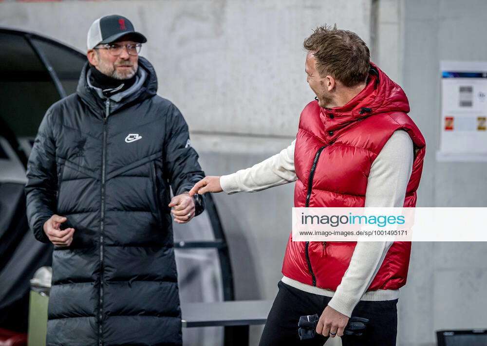 Liverpool coach Juergen Klopp and Leipzig coach Julian Nagelsmann stand together and talk UEFA Champions League Round of 16, second leg FC Liverpool RB Leipzig 2 0 10 03 2021, Puskas Arena in Budapest Hungary FC Liverpool RB Leipzig