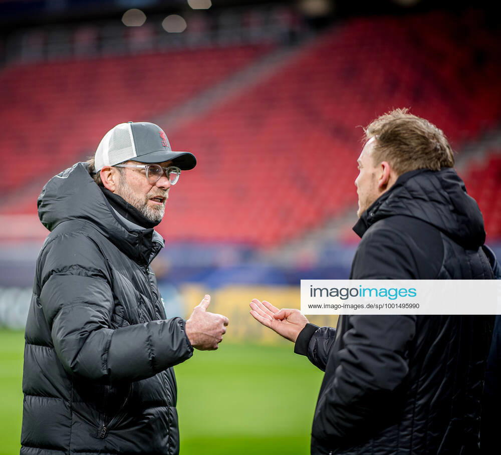 Liverpool coach Juergen Klopp and Leipzig coach Julian Nagelsmann stand together and talk UEFA Champions League Round of 16, second leg FC Liverpool RB Leipzig 2 0 10 03 2021, Puskas Arena in Budapest Hungary FC Liverpool RB Leipzig