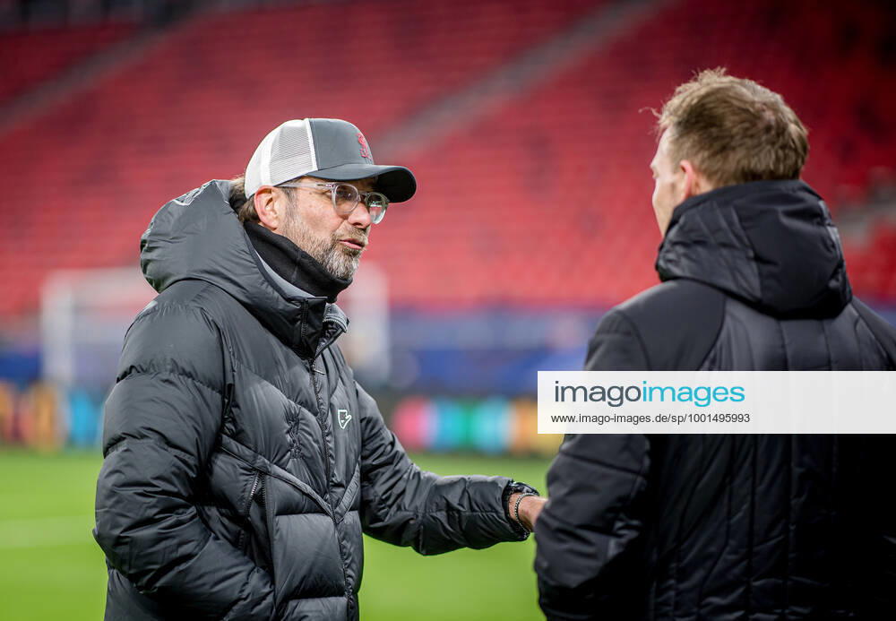 Liverpool coach Juergen Klopp and Leipzig coach Julian Nagelsmann stand together and talk UEFA Champions League Round of 16, second leg FC Liverpool RB Leipzig 2 0 10 03 2021, Puskas Arena in Budapest Hungary FC Liverpool RB Leipzig