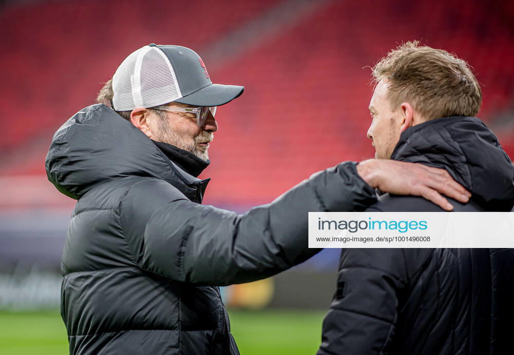 Liverpool coach Juergen Klopp and Leipzig coach Julian Nagelsmann stand together and talk UEFA Champions League Round of 16, second leg FC Liverpool RB Leipzig 2 0 10 03 2021, Puskas Arena in Budapest Hungary FC Liverpool RB Leipzig