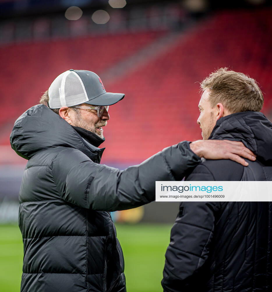 Liverpool coach Juergen Klopp and Leipzig coach Julian Nagelsmann stand together and talk UEFA Champions League Round of 16, second leg FC Liverpool RB Leipzig 2 0 10 03 2021, Puskas Arena in Budapest Hungary FC Liverpool RB Leipzig
