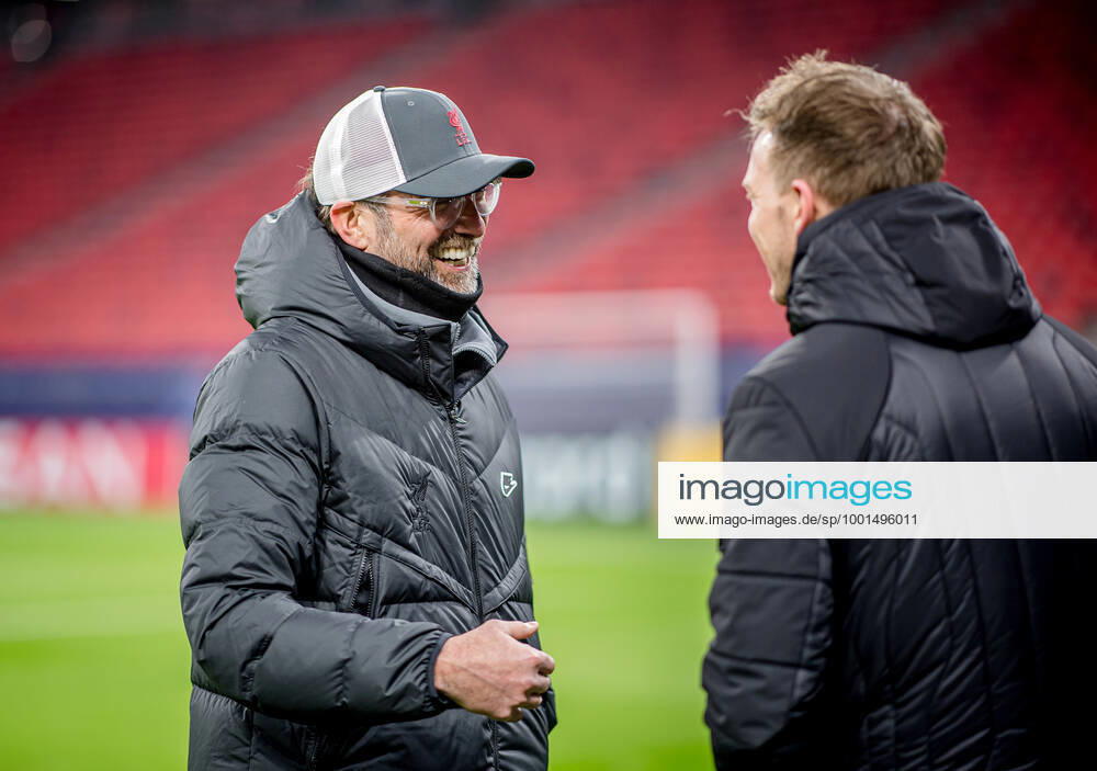 Liverpool coach Juergen Klopp and Leipzig coach Julian Nagelsmann stand together and talk UEFA Champions League Round of 16, second leg FC Liverpool RB Leipzig 2 0 10 03 2021, Puskas Arena in Budapest Hungary FC Liverpool RB Leipzig