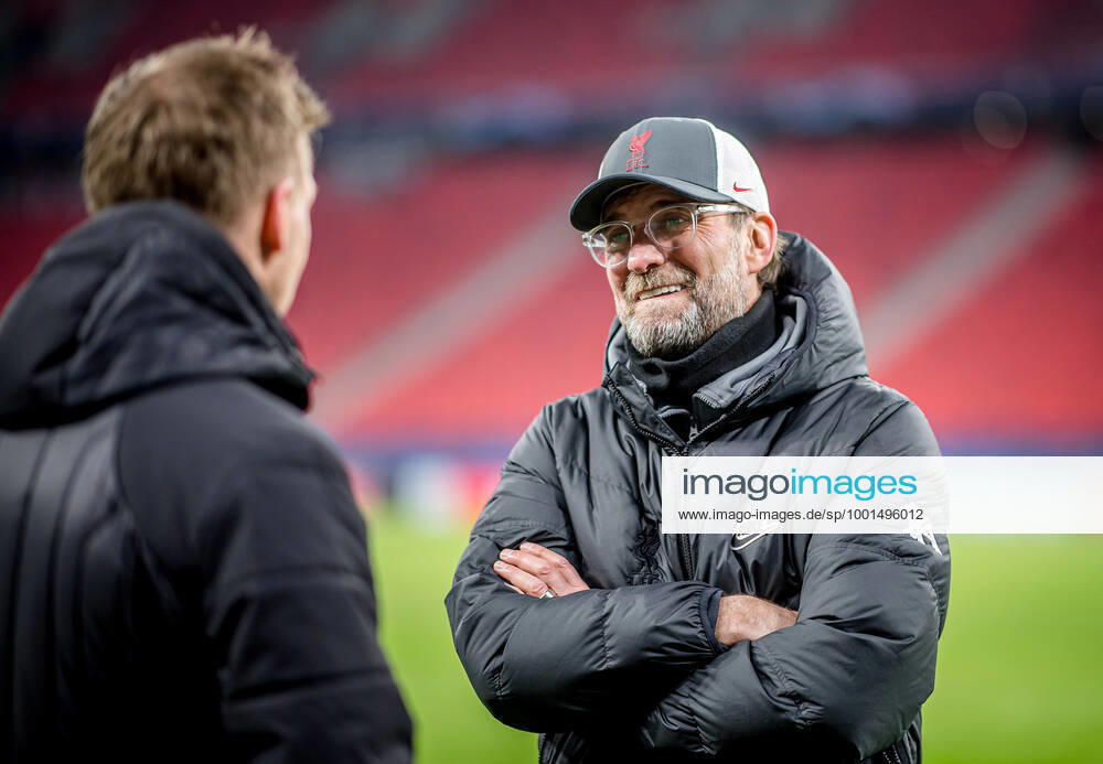 Liverpool coach Juergen Klopp and Leipzig coach Julian Nagelsmann stand together and talk UEFA Champions League Round of 16, second leg FC Liverpool RB Leipzig 2 0 10 03 2021, Puskas Arena in Budapest Hungary FC Liverpool RB Leipzig