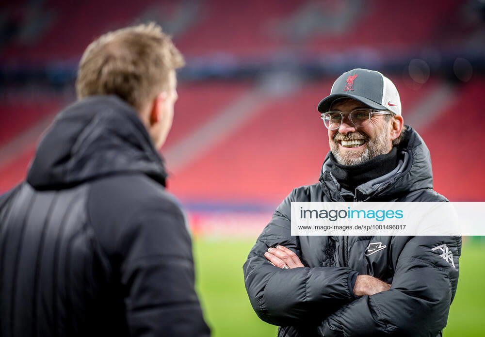 Liverpool coach Juergen Klopp and Leipzig coach Julian Nagelsmann stand together and talk UEFA Champions League Round of 16, second leg FC Liverpool RB Leipzig 2 0 10 03 2021, Puskas Arena in Budapest Hungary FC Liverpool RB Leipzig