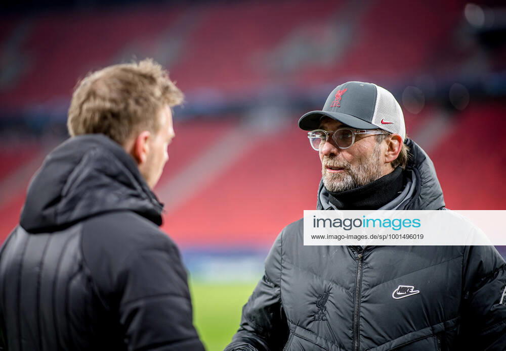 Liverpool coach Juergen Klopp and Leipzig coach Julian Nagelsmann stand together and talk UEFA Champions League Round of 16, second leg FC Liverpool RB Leipzig 2 0 10 03 2021, Puskas Arena in Budapest Hungary FC Liverpool RB Leipzig