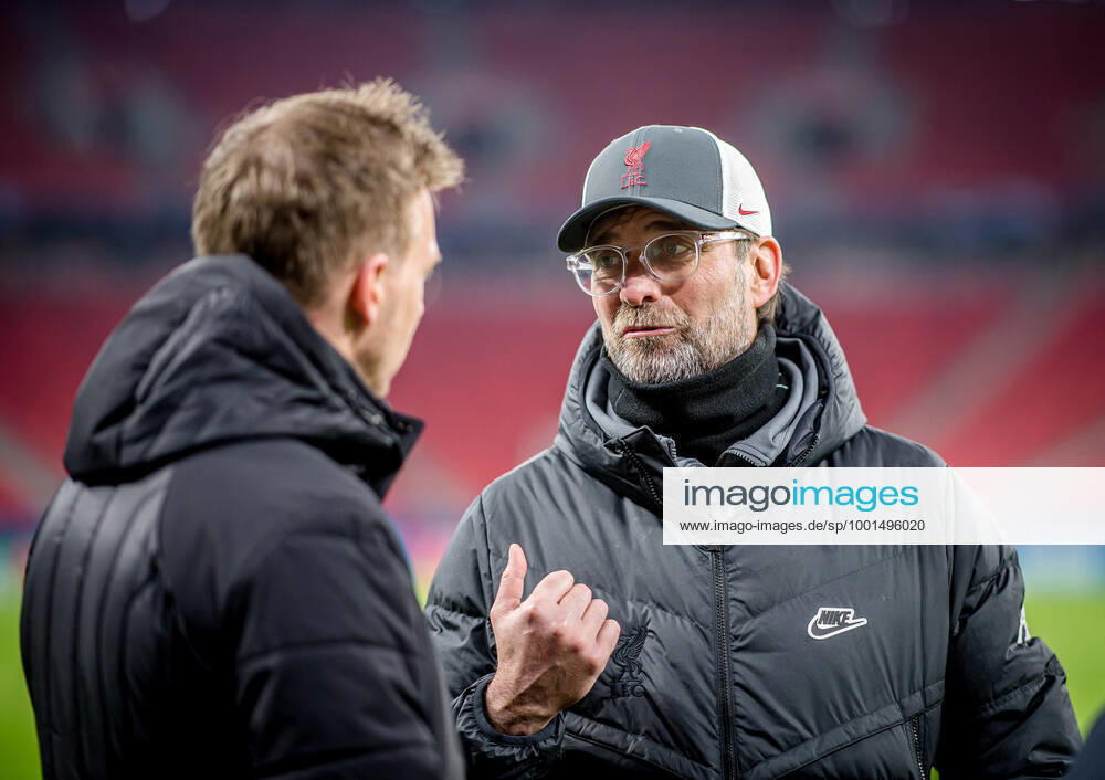 Liverpool coach Juergen Klopp and Leipzig coach Julian Nagelsmann stand together and talk UEFA Champions League Round of 16, second leg FC Liverpool RB Leipzig 2 0 10 03 2021, Puskas Arena in Budapest Hungary FC Liverpool RB Leipzig