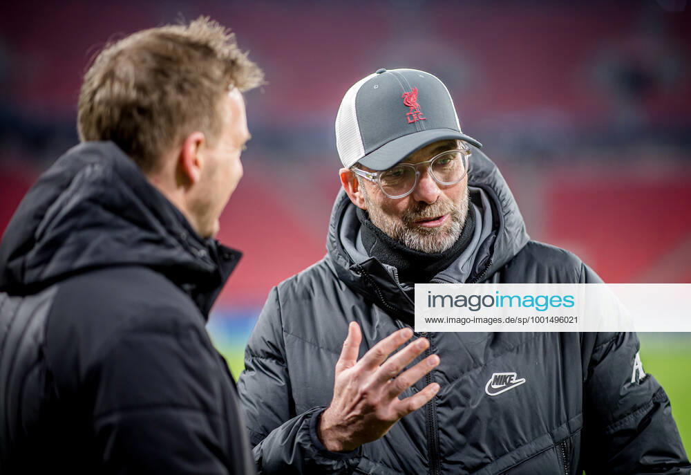 Liverpool coach Juergen Klopp and Leipzig coach Julian Nagelsmann stand together and talk UEFA Champions League Round of 16, second leg FC Liverpool RB Leipzig 2 0 10 03 2021, Puskas Arena in Budapest Hungary FC Liverpool RB Leipzig