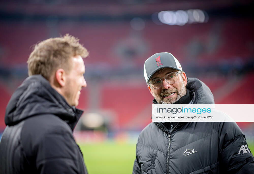 Liverpool coach Juergen Klopp and Leipzig coach Julian Nagelsmann stand together and talk UEFA Champions League Round of 16, second leg FC Liverpool RB Leipzig 2 0 10 03 2021, Puskas Arena in Budapest Hungary FC Liverpool RB Leipzig