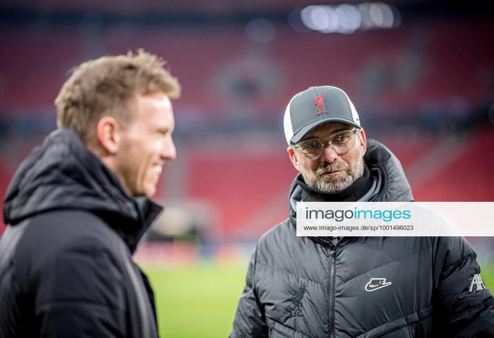 Liverpool coach Juergen Klopp and Leipzig coach Julian Nagelsmann stand together and talk UEFA Champions League Round of 16, second leg FC Liverpool RB Leipzig 2 0 10 03 2021, Puskas Arena in Budapest Hungary FC Liverpool RB Leipzig