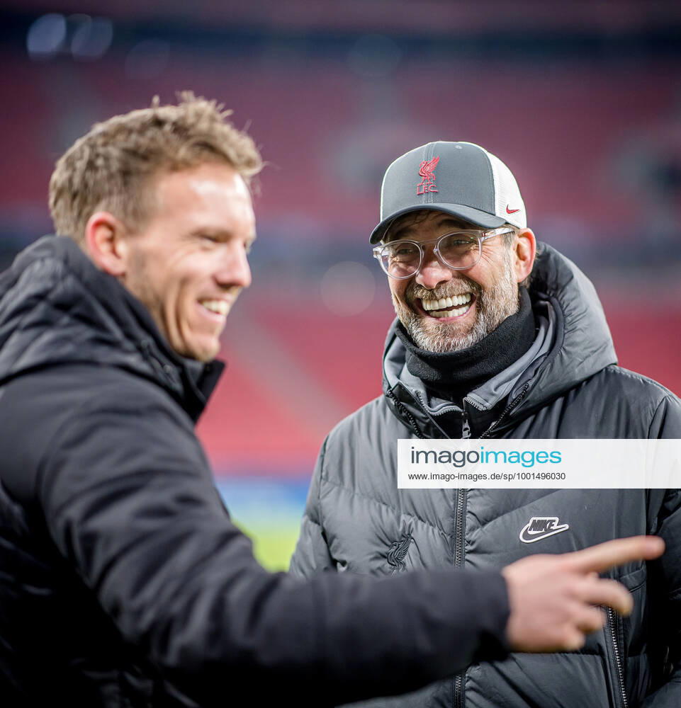 Liverpool coach Juergen Klopp and Leipzig coach Julian Nagelsmann stand together and talk UEFA Champions League Round of 16, second leg FC Liverpool RB Leipzig 2 0 10 03 2021, Puskas Arena in Budapest Hungary FC Liverpool RB Leipzig