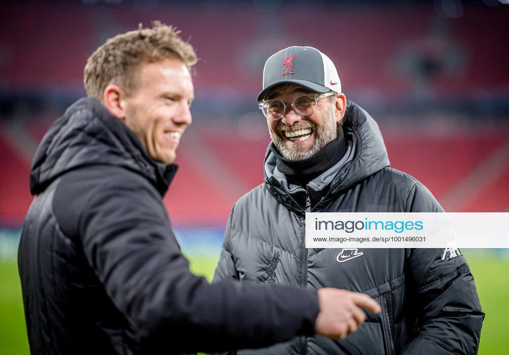 Liverpool coach Juergen Klopp and Leipzig coach Julian Nagelsmann stand together and talk UEFA Champions League Round of 16, second leg FC Liverpool RB Leipzig 2 0 10 03 2021, Puskas Arena in Budapest Hungary FC Liverpool RB Leipzig
