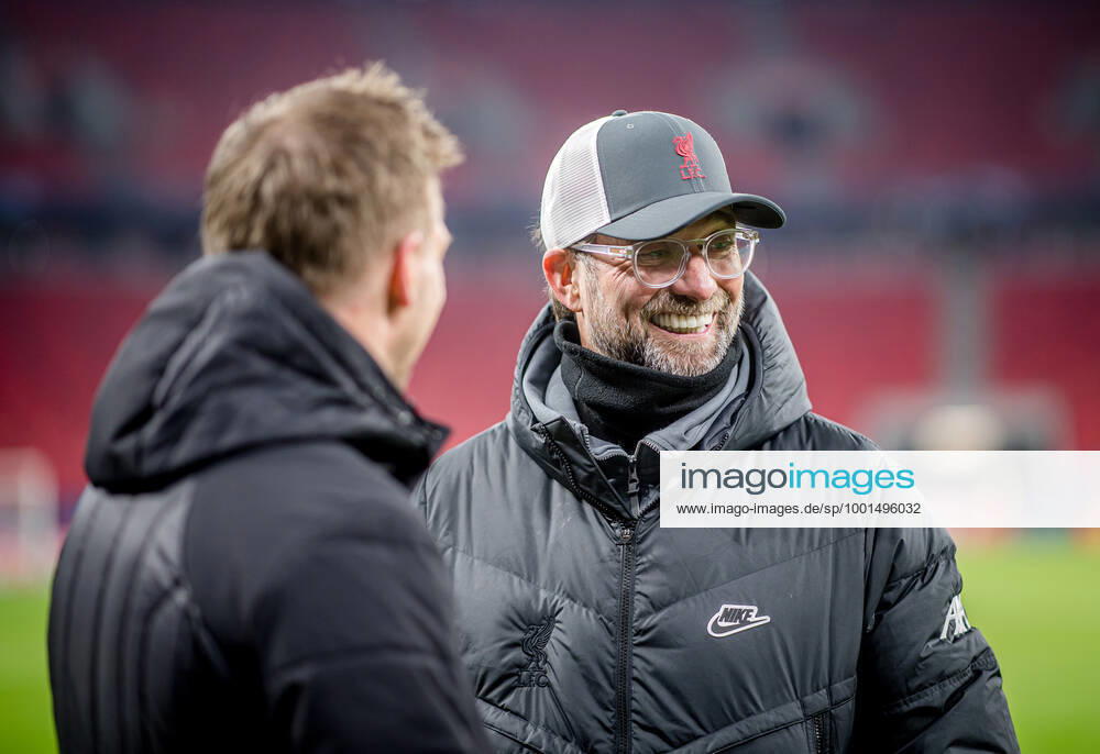 Liverpool coach Juergen Klopp and Leipzig coach Julian Nagelsmann stand together and talk UEFA Champions League Round of 16, second leg FC Liverpool RB Leipzig 2 0 10 03 2021, Puskas Arena in Budapest Hungary FC Liverpool RB Leipzig