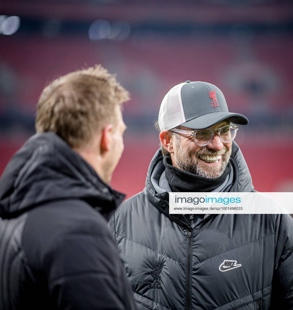 Liverpool coach Juergen Klopp and Leipzig coach Julian Nagelsmann stand together and talk UEFA Champions League Round of 16, second leg FC Liverpool RB Leipzig 2 0 10 03 2021, Puskas Arena in Budapest Hungary FC Liverpool RB Leipzig