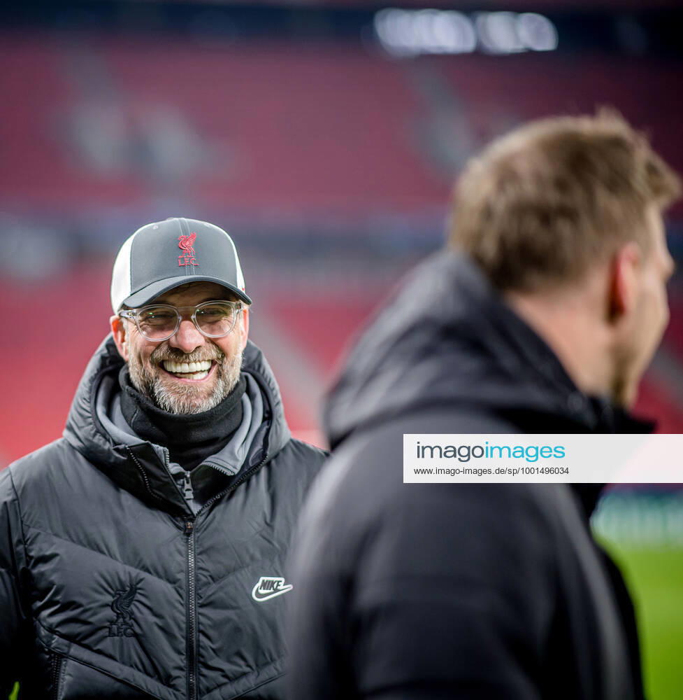 Liverpool coach Juergen Klopp and Leipzig coach Julian Nagelsmann stand together and talk UEFA Champions League Round of 16, second leg FC Liverpool RB Leipzig 2 0 10 03 2021, Puskas Arena in Budapest Hungary FC Liverpool RB Leipzig