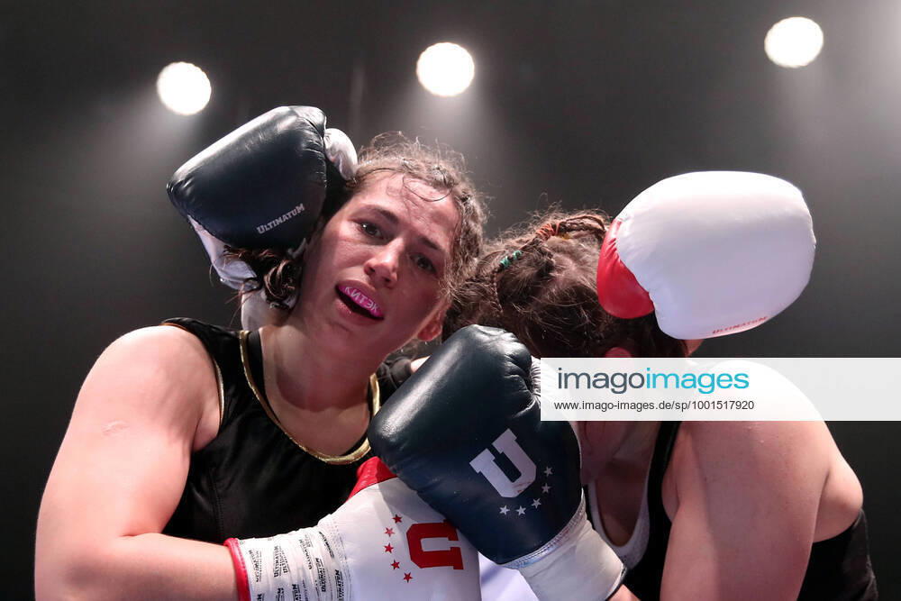 KW11 MOSCOW, RUSSIA - MARCH 20, 2021: Russia s Anastasiya Kruzhkova (L) and Luiza Davydova fight in their middleweight bout at a professional boxing event at Megasport Arena. Valery Sharifulin TASS TS0F9F93