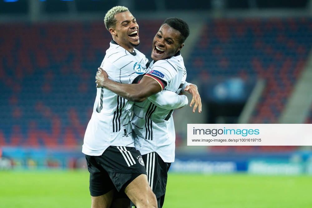 KW12 Hungary v Germany, UEFA EURO, EM, Europameisterschaft,Fussball U-21 championship, Szekesfehervar, Hungary Szekesfehervar, Hungary. 24th, March 2021. Bote Baku (21) of Germany scores for 0-2 and celebrates with Lukas Nmecha (10) during the UEFA EURO U-21 match between Hungary and Germany at Sostoi Stadion in Szekesfehervar. Szekesfehervar Hungary