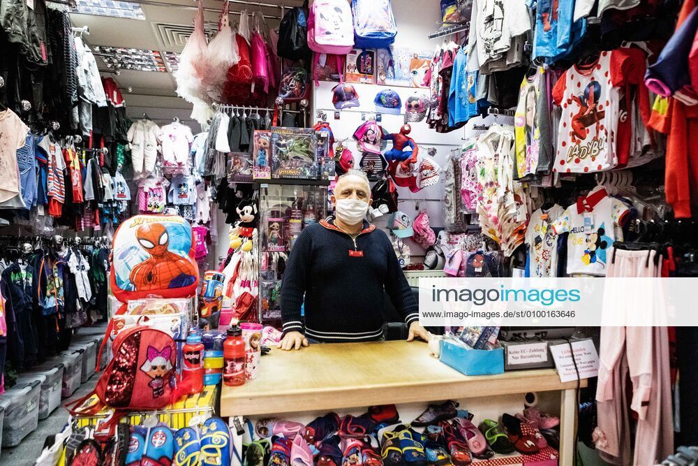 (200430) -- BERLIN, April 30, 2020 (Xinhua) -- A staff member wearing a face mask is seen at a shop in Berlin, capital of Germany, on April 29, 2020. Berlin made masks mandatory in stores on Wednesday, as the obligation to cover the mouth and nose has already been in force for public transportation since Monday. (Photo by Binh Truong Xinhua) GERMANY-BERLIN-COVID-19-FACE MASK-MANDATORY IN STORES