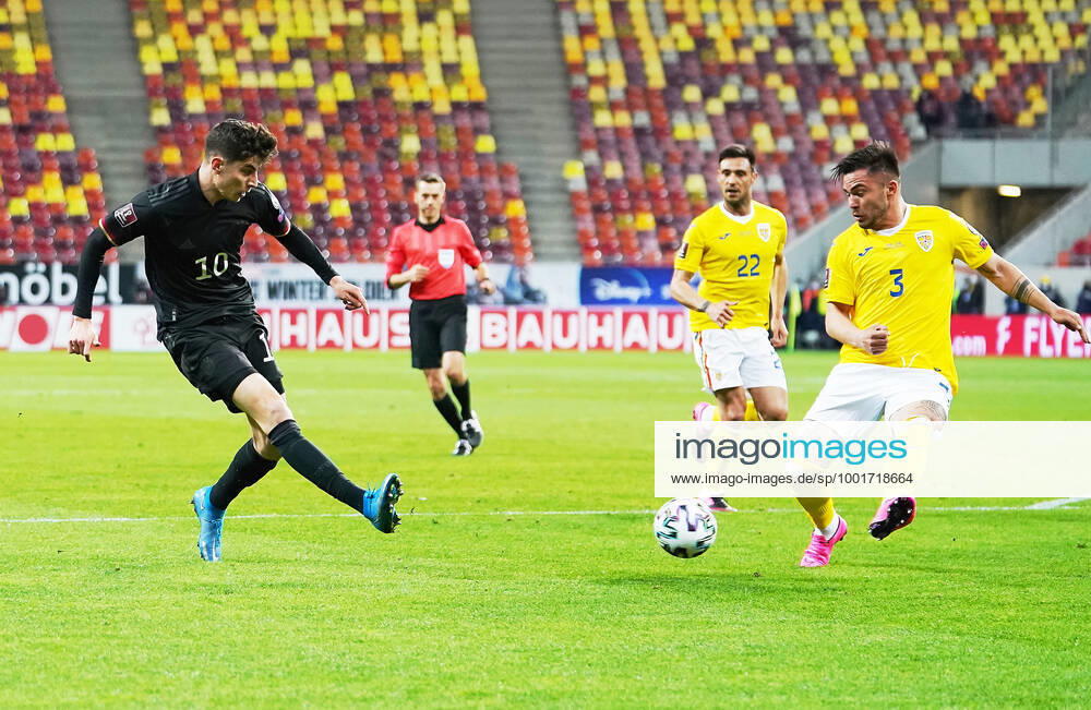 Kai HAVERTZ, DFB 10 compete for the ball, tackling, duel, header, zweikampf, action, fight against Alin TOSCA, ROM 3 in the match ROMANIA - GERMANY 0-1 Rumänien - Deutschland 0-1 Qualification for World Championships 2022, WM Quali, Season 2020 2021, March 28, 2021 in Bucharest, Bukarest, Romania.