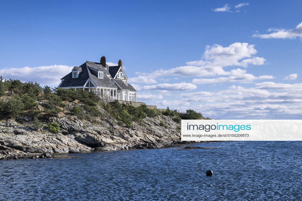 Picturesque waterfront house with ocean views along Ocean Drive on Rhode Island. NR H&M H