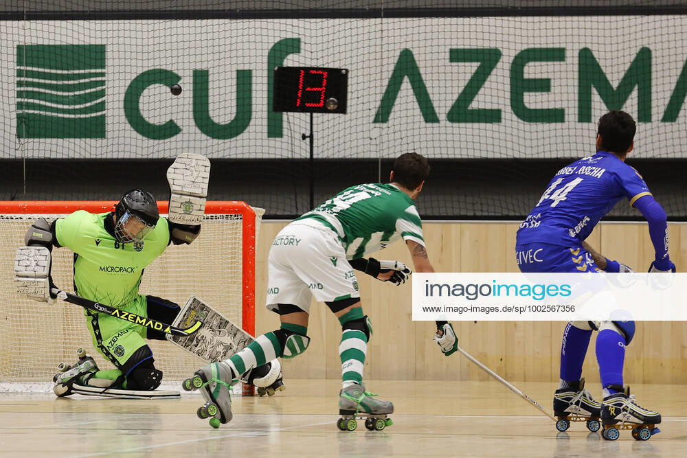 Sporting CP v OC Barcelos - Rink Hockey 1st Division Playoff Miguel Rocha shoots and Angelo Girao defends during the Rink Hockey playoffs 1st leg between Sporting CP and OC Barcelos, at Pavilhao Joao Rocha, Lisboa, Portugal, 08, May, 2021 Lisbon Portugal rico-sporting210508_npnpb