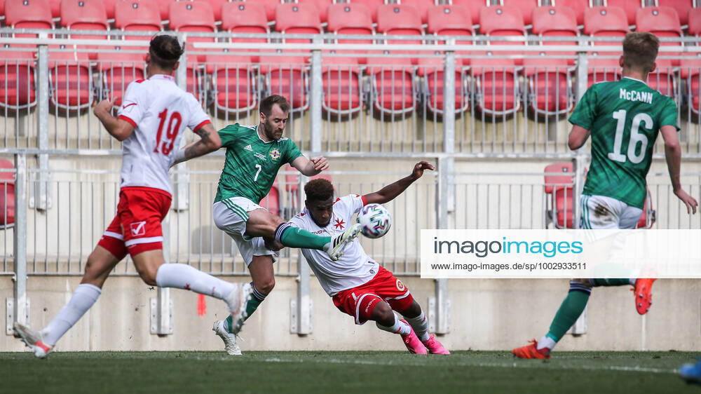 SOCCER - UEFA EURO, EM, Europameisterschaft,Fussball 2020, preview KLAGENFURT,AUSTRIA,30.MAY.21 - SOCCER - UEFA European Championship, EM, Europameisterschaft preview, international match, Länderspiel, Nationalmannschaft Northern Ireland vs Malta, friendly match. Image shows Bailey Paecock Farrell (NIR) and Joseph Mbong (MLT). GEPAxpictures xDanielxGoetzhaber