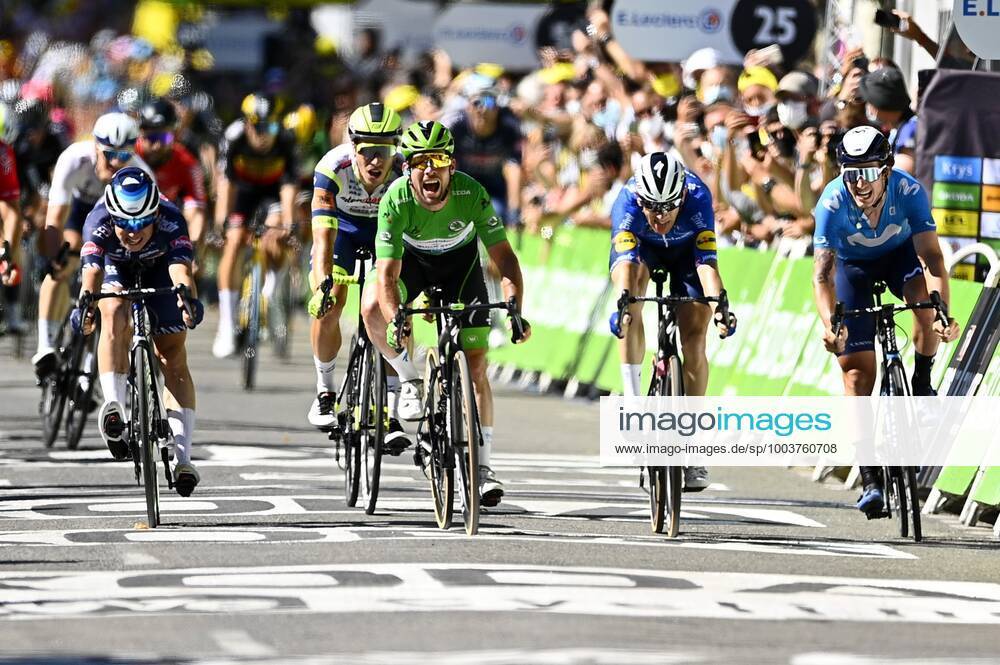 CARCASSONNE, FRANCE - JULY 09 : CAVENDISH Mark (GBR) of DECEUNINCK - QUICK-STEP wins the sprint before MORKOV Michael (DEN) of DECEUNINCK - QUICK-STEP and PHILIPSEN Jasper (BEL) of ALPECIN-FENIX during stage 13 of the 108th edition of the 2021 Tour de France cycling race, a stage of 219,9 kms between Nimes and Carcassonne. on July 9, 2021 in Carcassonne, France, 9 07 2021 CYCLISME : Tour de France 2021 - Etape 13 - Nimes to Carcassonne - 09 07 2021 PHOTONEWS PANORAMIC